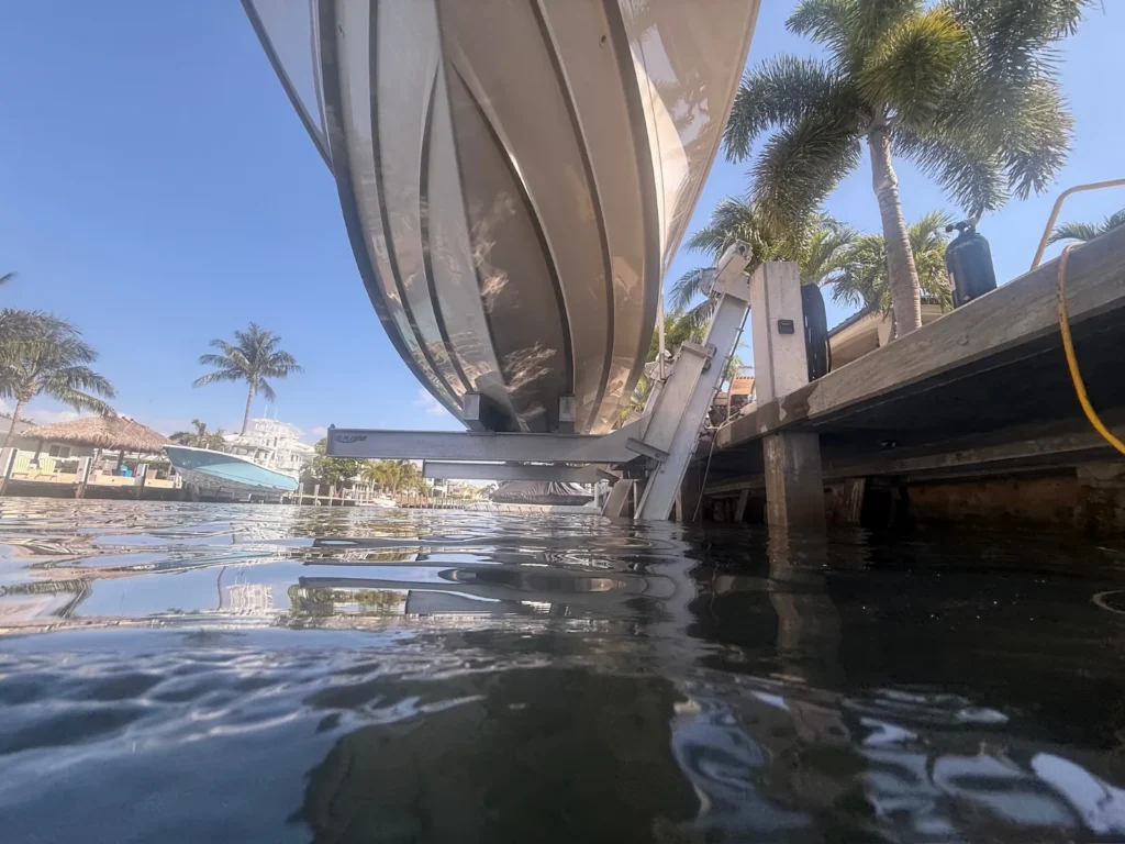a boat lift ready to be cleaned at a marina in Fort Lauderdale, FL